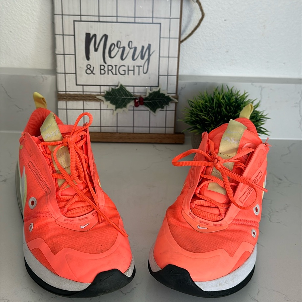 Orange Nike women’s shoes size 7 w